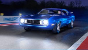 Car with bright headlights on at night